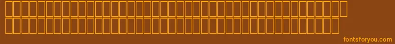 Czcionka AcsTopazzExtraBold – pomarańczowe czcionki na brązowym tle