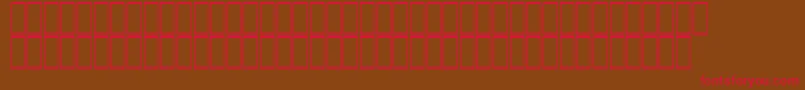 AcsTopazzExtraBold-fontti – punaiset fontit ruskealla taustalla
