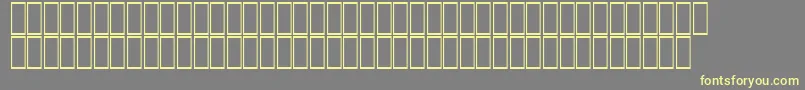 フォントAcsTopazzExtraBold – 黄色のフォント、灰色の背景