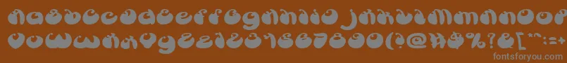 フォントButterflyBold – 茶色の背景に灰色の文字