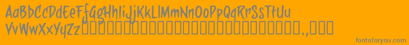 Sbbtrial-Schriftart – Graue Schriften auf orangefarbenem Hintergrund