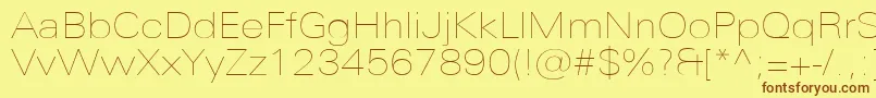 UniversNextProUltralightExtended Font – Brown Fonts on Yellow Background