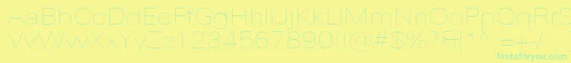 Fonte UniversNextProUltralightExtended – fontes verdes em um fundo amarelo