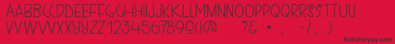 Czcionka DkKunstschau – czarne czcionki na czerwonym tle