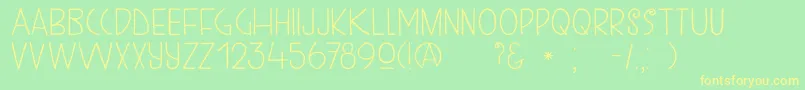 DkKunstschau Font – Yellow Fonts on Green Background