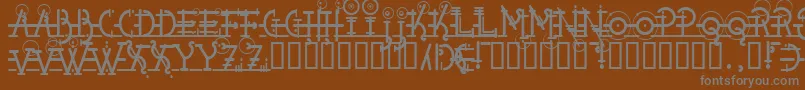 Snipple-Schriftart – Graue Schriften auf braunem Hintergrund