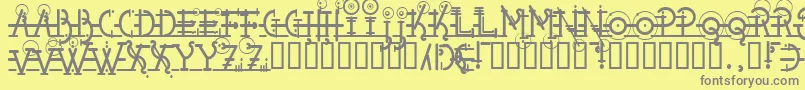 Snipple-fontti – harmaat kirjasimet keltaisella taustalla