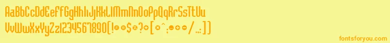 フォントBadlocicg – オレンジの文字が黄色の背景にあります。