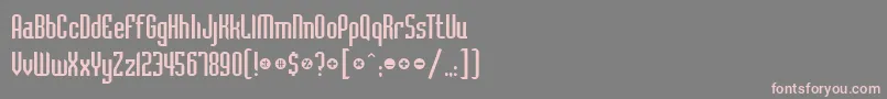 フォントBadlocicg – 灰色の背景にピンクのフォント