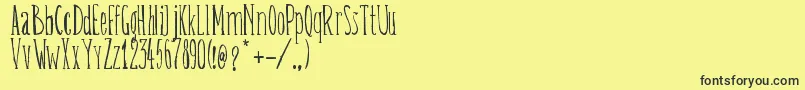 BelisaPlumillaManual Font – Black Fonts on Yellow Background