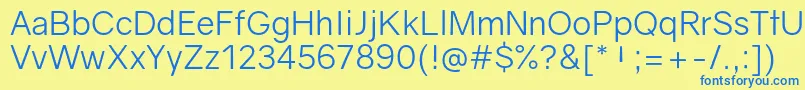 GravityBook Font – Blue Fonts on Yellow Background