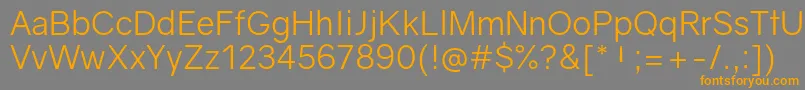 GravityBook Font – Orange Fonts on Gray Background