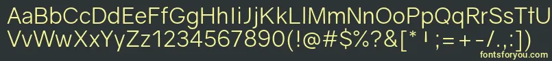 GravityBook Font – Yellow Fonts on Black Background