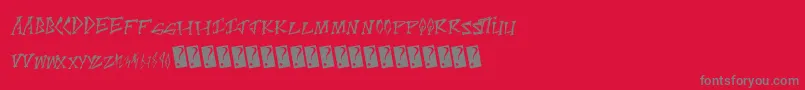 Scratchpoint-fontti – harmaat kirjasimet punaisella taustalla