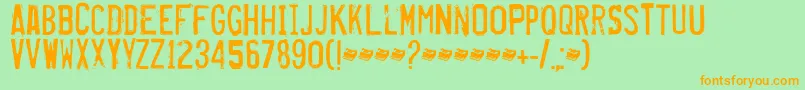フォントMisproject – オレンジの文字が緑の背景にあります。