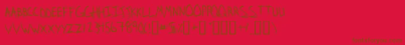 フォントStridslystenMedium – 赤い背景に茶色の文字