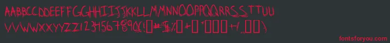 フォントStridslystenMedium – 黒い背景に赤い文字