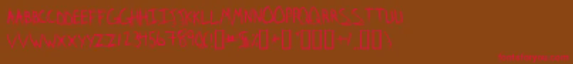 StridslystenMedium Font – Red Fonts on Brown Background