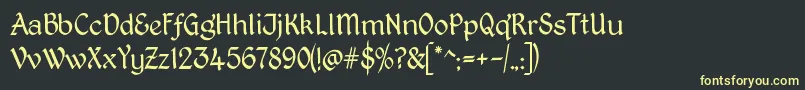 フォントKingthingsPetrockLight – 黒い背景に黄色の文字