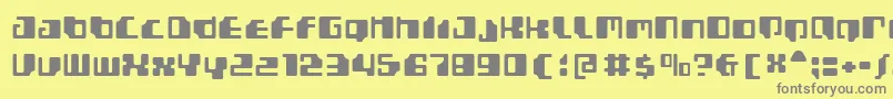 Gamma1500-fontti – harmaat kirjasimet keltaisella taustalla