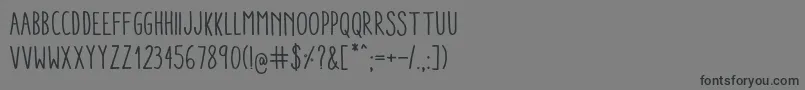 AracneCondensedRegular-fontti – mustat fontit harmaalla taustalla