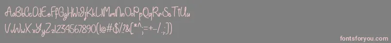 EinhornSchriftOtf-Schriftart – Rosa Schriften auf grauem Hintergrund