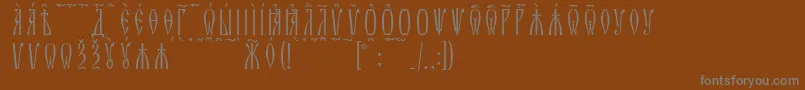 Шрифт ZlatoustKucsSpacedout – серые шрифты на коричневом фоне