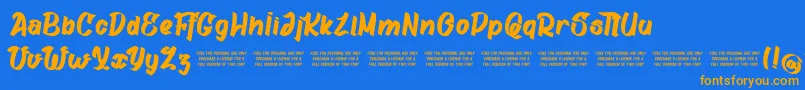 GatalikePersonalUse-Schriftart – Orangefarbene Schriften auf blauem Hintergrund