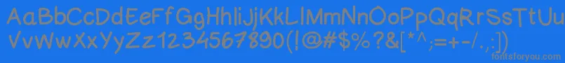フォントComicneuesansid – 青い背景に灰色の文字