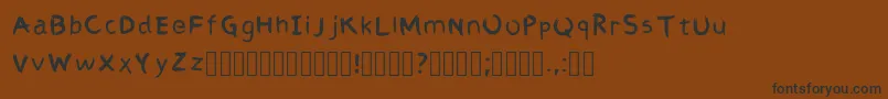 AbbiRegular Font – Black Fonts on Brown Background
