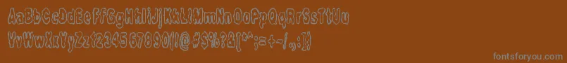 FidgetyBrk Font – Gray Fonts on Brown Background