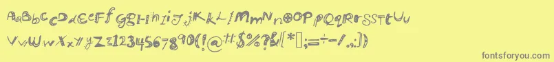 Manikmanik Font – Gray Fonts on Yellow Background