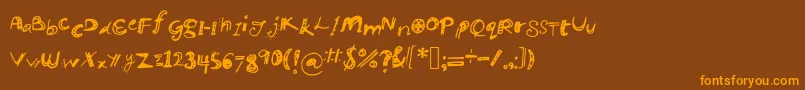 Manikmanik Font – Orange Fonts on Brown Background