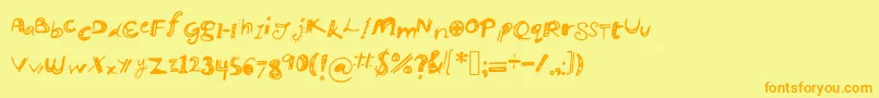フォントManikmanik – オレンジの文字が黄色の背景にあります。