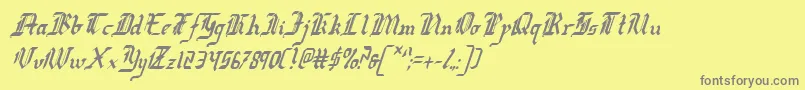 フォントRedcoatCondensedItalic – 黄色の背景に灰色の文字