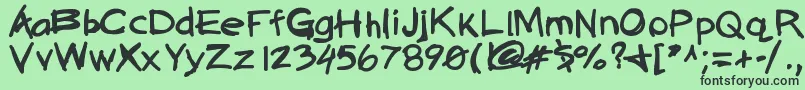 Quickasabunny Font – Black Fonts on Green Background