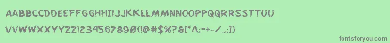 フォントFlesheatingbold – 緑の背景に灰色の文字