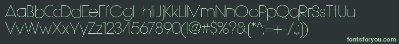 フォントHasteristico – 黒い背景に緑の文字