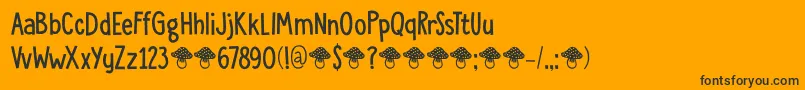 Fonte DkToadstool – fontes pretas em um fundo laranja