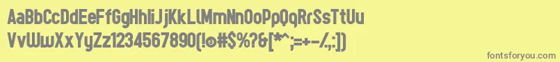 フォントTesBoldР™ – 黄色の背景に灰色の文字