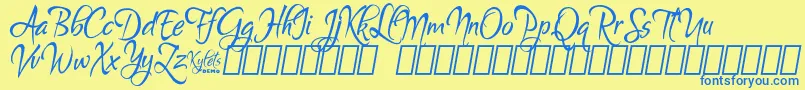 Fonte KyletsDemo – fontes azuis em um fundo amarelo