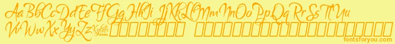 フォントKyletsDemo – オレンジの文字が黄色の背景にあります。