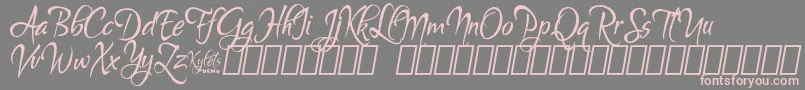 Fonte KyletsDemo – fontes rosa em um fundo cinza