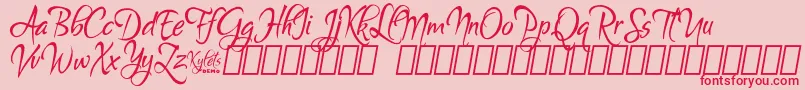 Czcionka KyletsDemo – czerwone czcionki na różowym tle