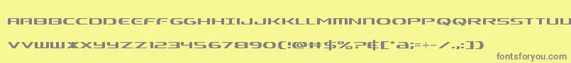 フォントAlphamencond – 黄色の背景に灰色の文字
