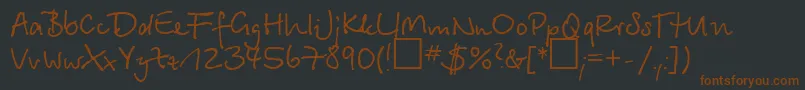 Шрифт BetinascriptNormal – коричневые шрифты на чёрном фоне