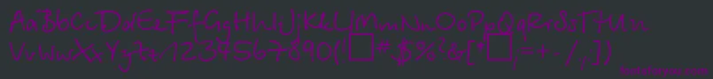 Czcionka BetinascriptNormal – fioletowe czcionki na czarnym tle