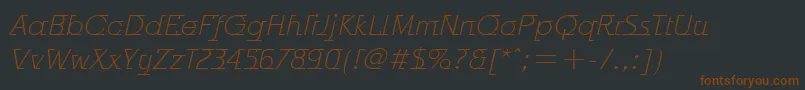 Шрифт OdysseeItcTtLightitalic – коричневые шрифты на чёрном фоне