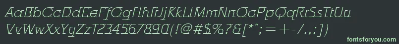 フォントOdysseeItcTtLightitalic – 黒い背景に緑の文字