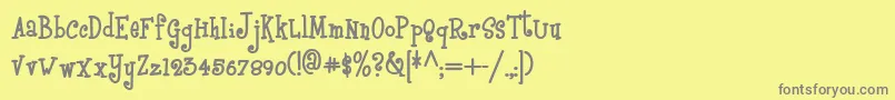 Boyzrgrossnf-fontti – harmaat kirjasimet keltaisella taustalla